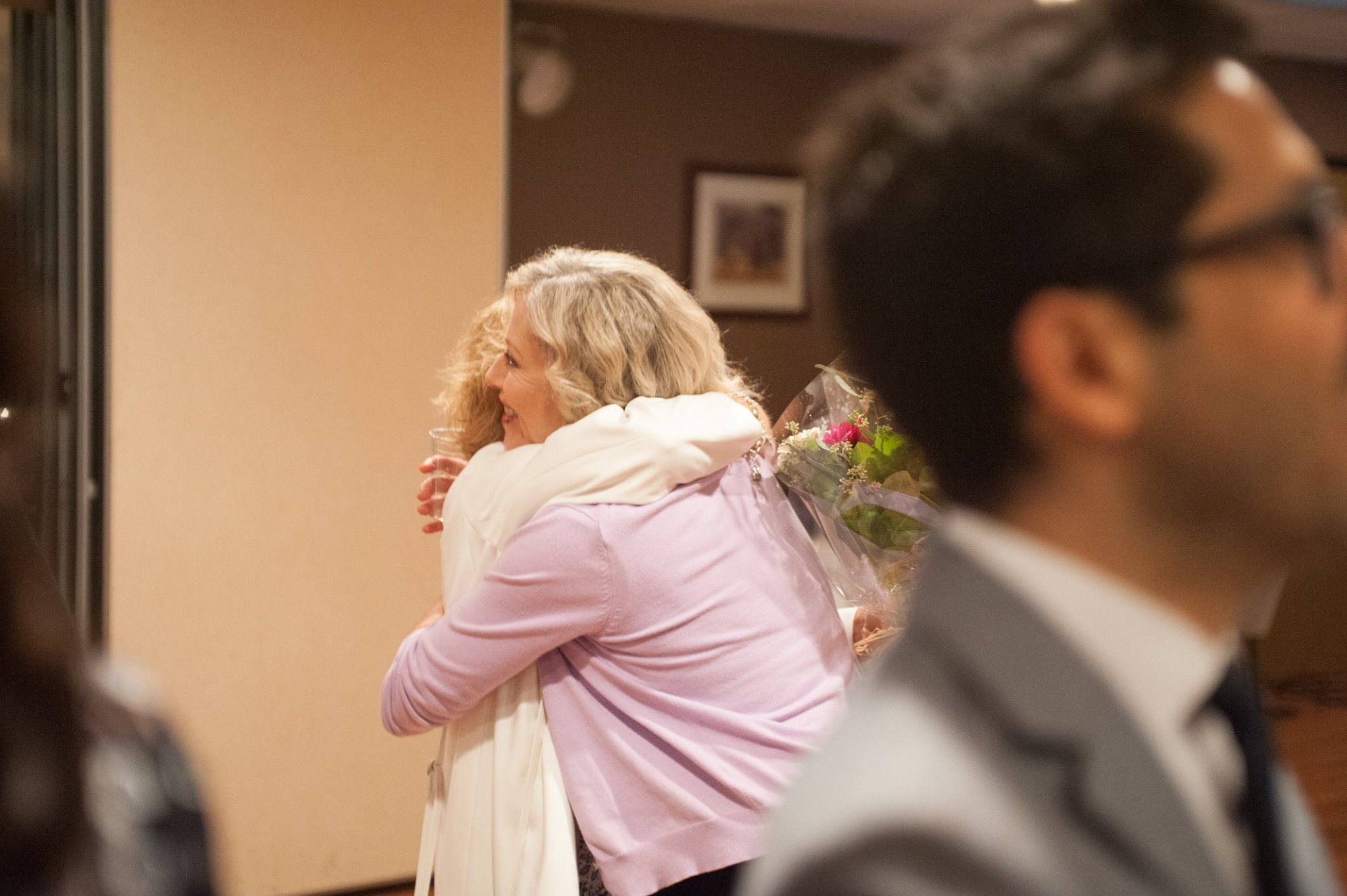 Bea Rhodes, President of Rhodes College, embraces an alumnus at the 20th Anniversary Alumni Reunion